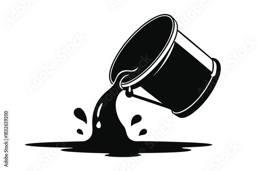 Inverted metal bucket empties black liquid onto white surface, creating spill