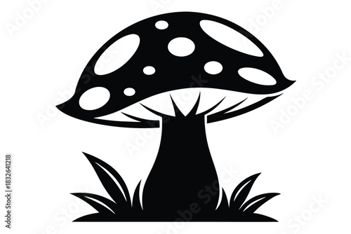 Simple black and white mushroom illustration stands among grass in a stylized pattern