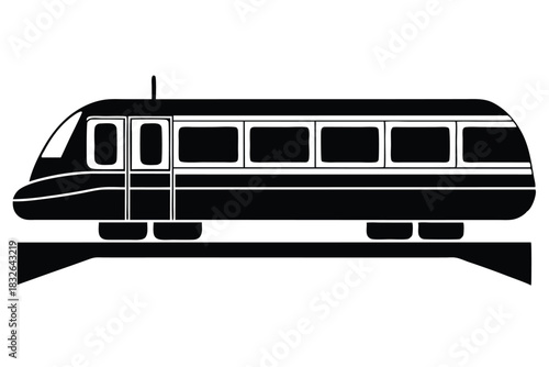 An isolated train glides across its tracks in this striking black and white image