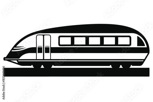 Monochrome bullet train travels across the tracks at high speed, leaving the station behind