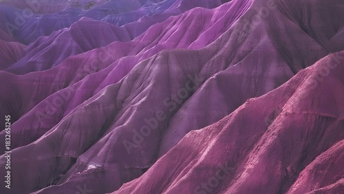 Abstract textured purple and pink landscape with dramatic lighting
