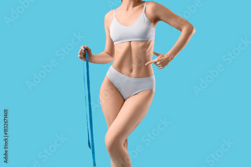 Young woman in underwear wi...