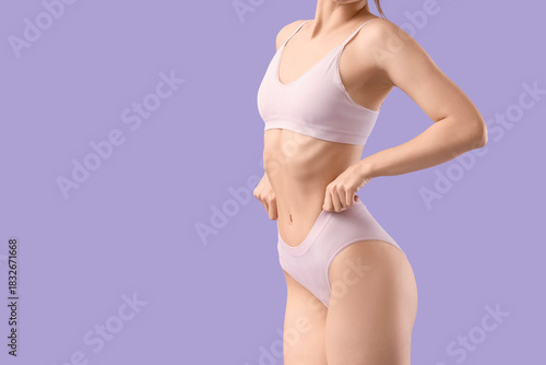 Young woman in underwear on...