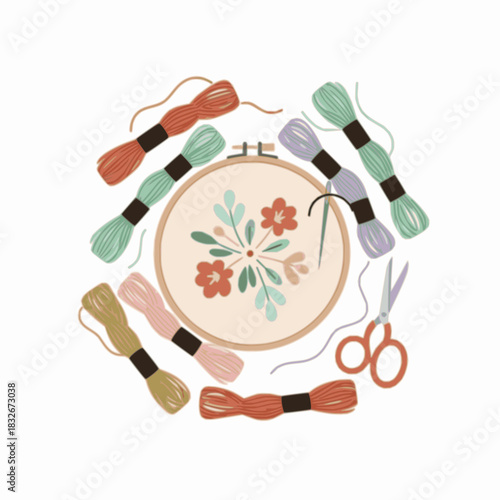 Embroidery supplies around hoop, flat lay