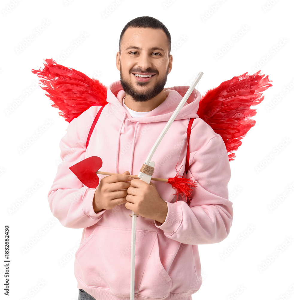 Fototapeta premium Young man with Cupid's wings and bow on white background. Valentine's Day celebration