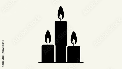 Three black candles with lit flames stand in a row on a light background symbolizing light hope and remembrance