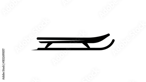 Simple black silhouette of a classic wooden sled with curved runners and a flat seat isolated on a clean white background representing winter fun and outdoor activities