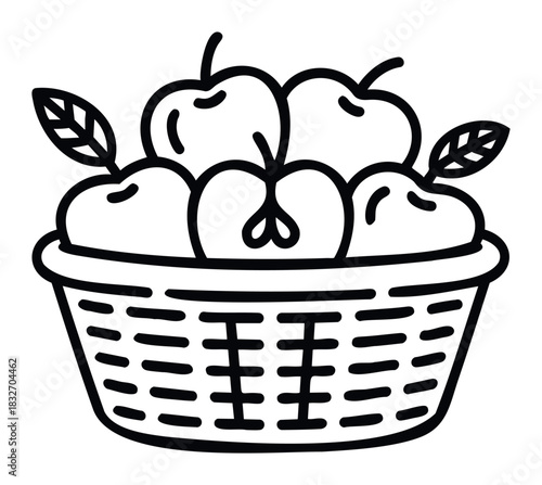 Basket overflowing with ripe apples and fresh leaves, perfect for harvest themes, healthy eating promotions, and fall season marketing visuals.