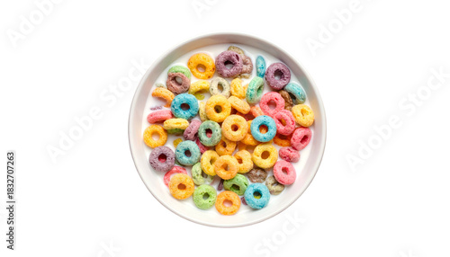 Overhead shot of a bowl with colorful, circular cereal pieces floating in milk