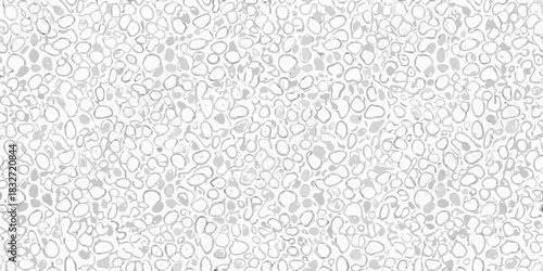 Monochrome pebble stone texture background with random shapes and smooth surface