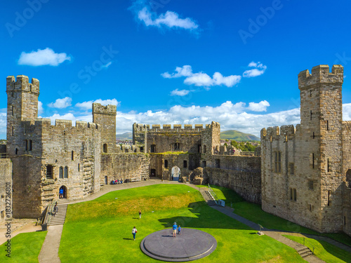 Queen's Gate and the Investiture dais inside the grassy Inner Ward of Caernarfon Castle (Caernarfon, Wales, United Kingdom)
