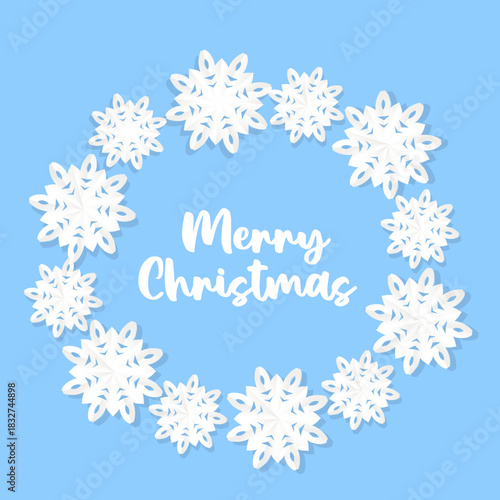 Beautiful frame from white Christmas applique snowflakes on blue background