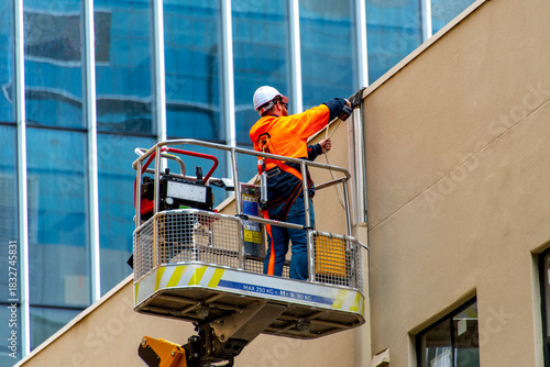 Electrician Working in a Boom Lift