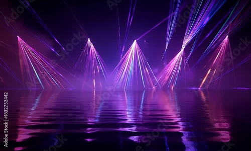 Vibrant purple and pink laser beams create a dazzling light show reflected on a rippling water surface in a dark atmospheric environment