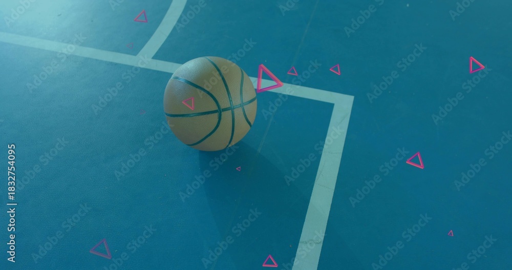 Fototapeta premium Resting orange basketball on outdoor blue court by white line, casting shadow with pink triangles