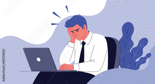 Stressed businessman holding his head in pain while looking at a laptop screen.