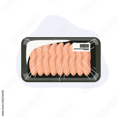Top view of packaged raw chicken breast slices in sealed plastic tray with barcode label for grocery store