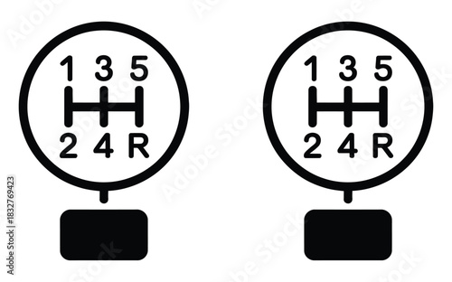 Close up of two manual car gear shift knobs showing different patterns.