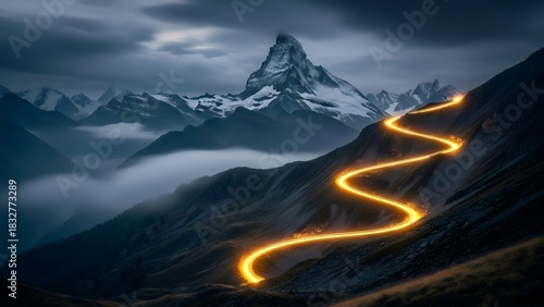 Glowing Golden Path Winding up a Dark Mountain Peak with Snowy Summit and Dramatic Clouds. Success, Journey, Challenge, Ambition, Technology, Data Flow, and Concept of The Way