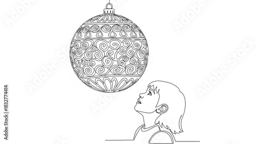 A young child with short hair looks up in wonder at a large ornate christmas ornament hanging from above captured in a simple line drawing style