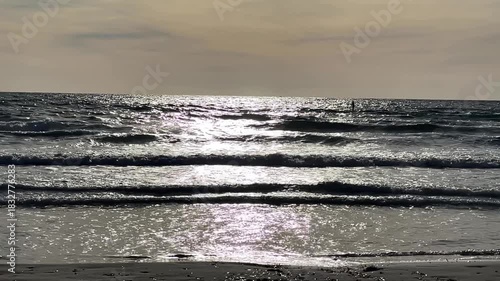 Paguera beach with strong wind , high Waves and Surfer, Calvia, Mallorca, Spain