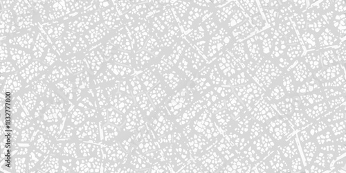 Abstract light gray and white pattern with irregular shapes and lines