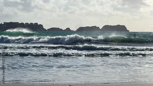 Paguera beach with strong wind , high Waves and Surfer, Calvia, Mallorca, Spain