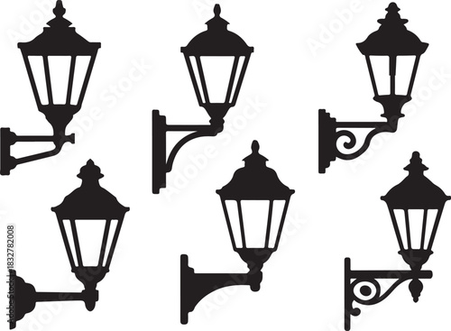 Set of black silhouette street wall lanterns decorative elements on chess background of old town