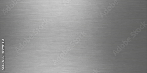 Brushed metal texture of a gray aluminum surface with a shiny, industrial pattern