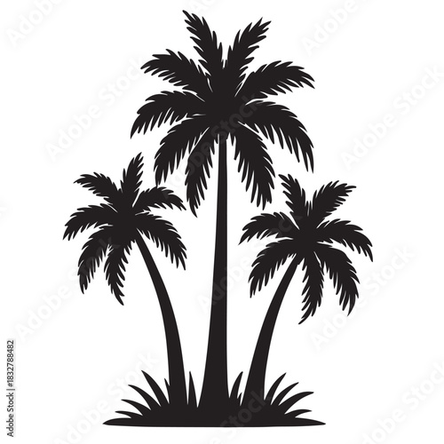 Silhouette of three palm trees on a grassy mound tropical