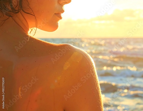 Woman enjoying the warm sunset on a tropical beach destination and vacation