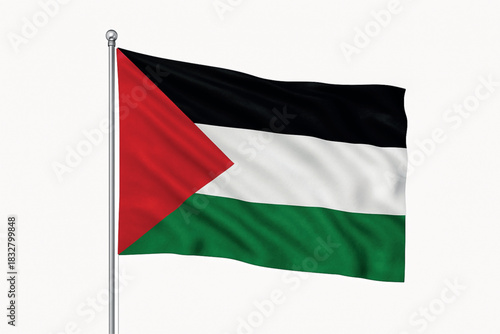 Palestinian flag waving on flagpole against white background