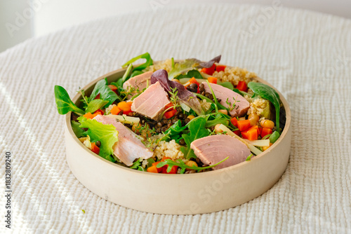 Bowl of salad with tuna steak