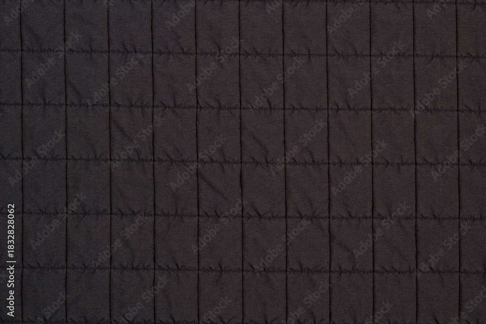 Fototapeta premium Quilted fabric. The texture of the blanket. Background to your project