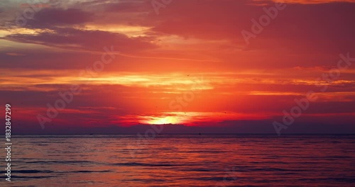 Scenic caribbean sunrise over the sea horizon, tropical ocean sunset landscape video