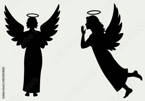Two full figure female angel silhouette vector designs with flowing wings and spiritual halos symbolizing messengers, divine announcement or peaceful ethereal presence for holiday greeting design.
