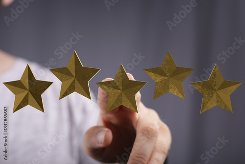 Person's hand touching five...