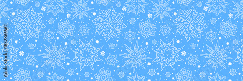 Abstract white vector snowflakes on blue background