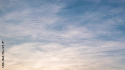 Evening sky time-lapse capturing the shift from sunset glow to nighttime darkness with subtle cloud movement.
