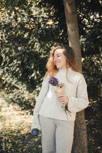 A woman in a dress on a summer picnic with lemons