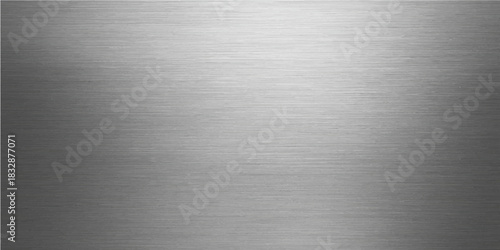 Brushed metal surface with a silver texture and metallic reflection pattern for an industrial design backdrop