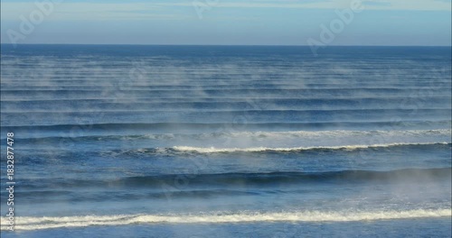 Beautiful ocean landscape with mist rising from the water temperature 
