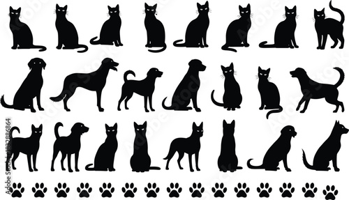 Collection of black cat and dog silhouettes with paw prints animal