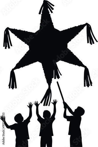 Silhouette of children reaching for a star shaped piñata