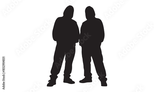Two men standing together in hoodies representing friendship or partnership silhouette