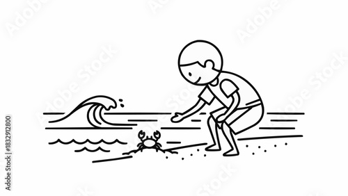 A young boy curiously reaching for a small crab on the seashore.