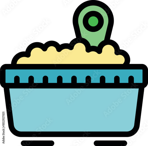 Baby bathtub filled with soap suds and a green toy, representing bath time for infants and toddlers