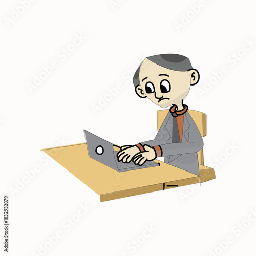 Focused businessman sitting at a desk typing on a laptop computer