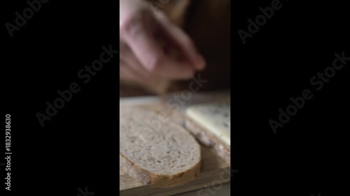 Woman Making Blue Cheese Sandwich at Home
