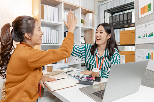 A group of professionals engaged in a collaborative business meeting, exchanging innovative ideas and strategies to build growth and success in a modern startup environment.